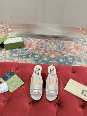 UA WOMEN'S HORSEBIT MID-HEEL SLIDE SANDAL