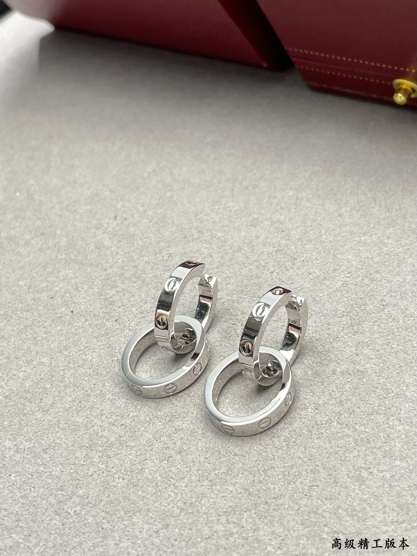 Ca*t*er Double Ring Polished Earrings