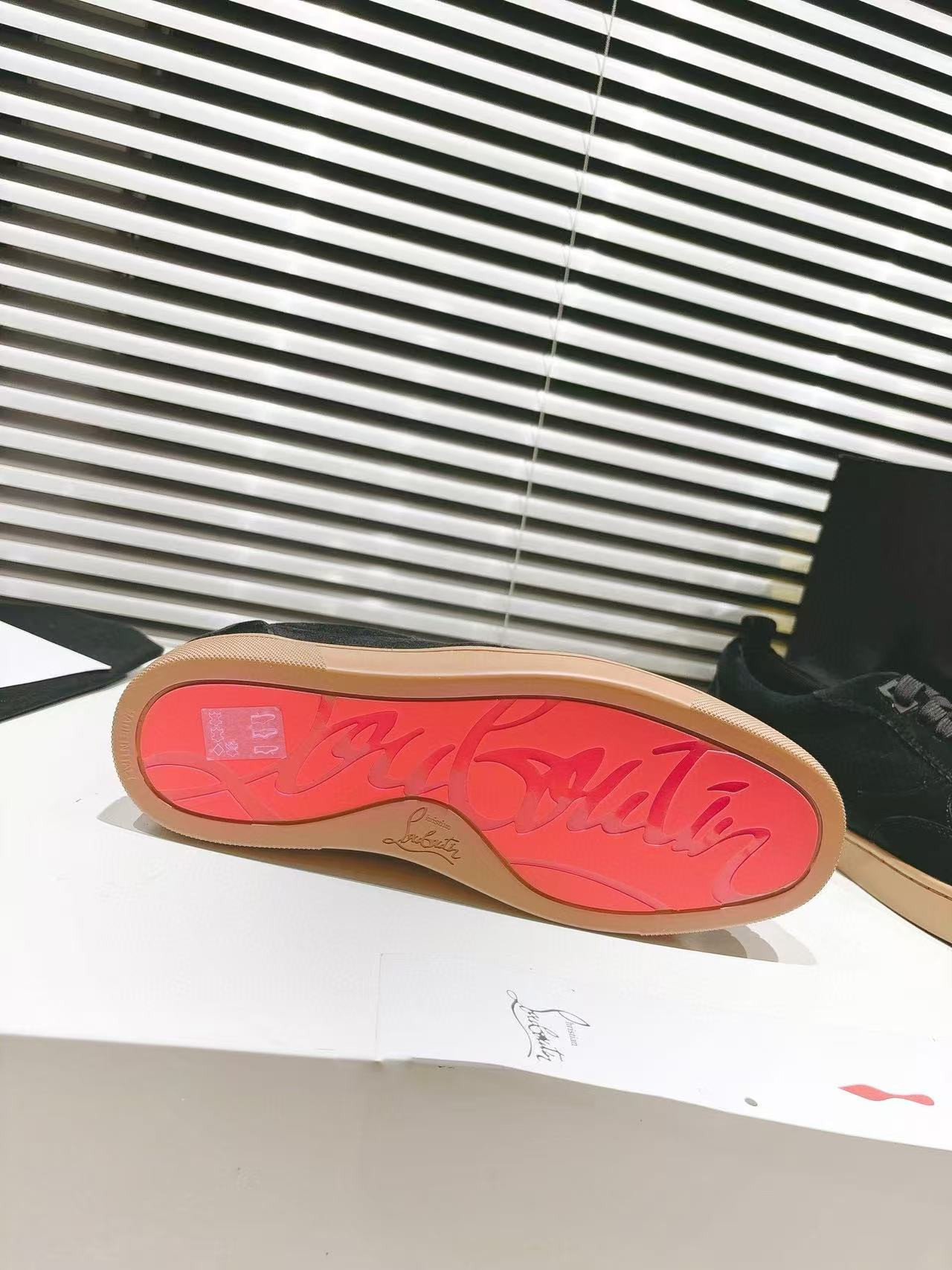 UA Ch**an Louboutin Sneaker