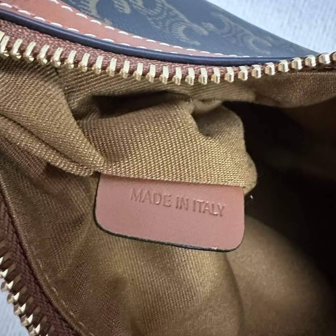 Ce**e SMALL HELOÏSE BAG IN TRIOMPHE CANVAS AND CALFSKIN 19x22x5cm