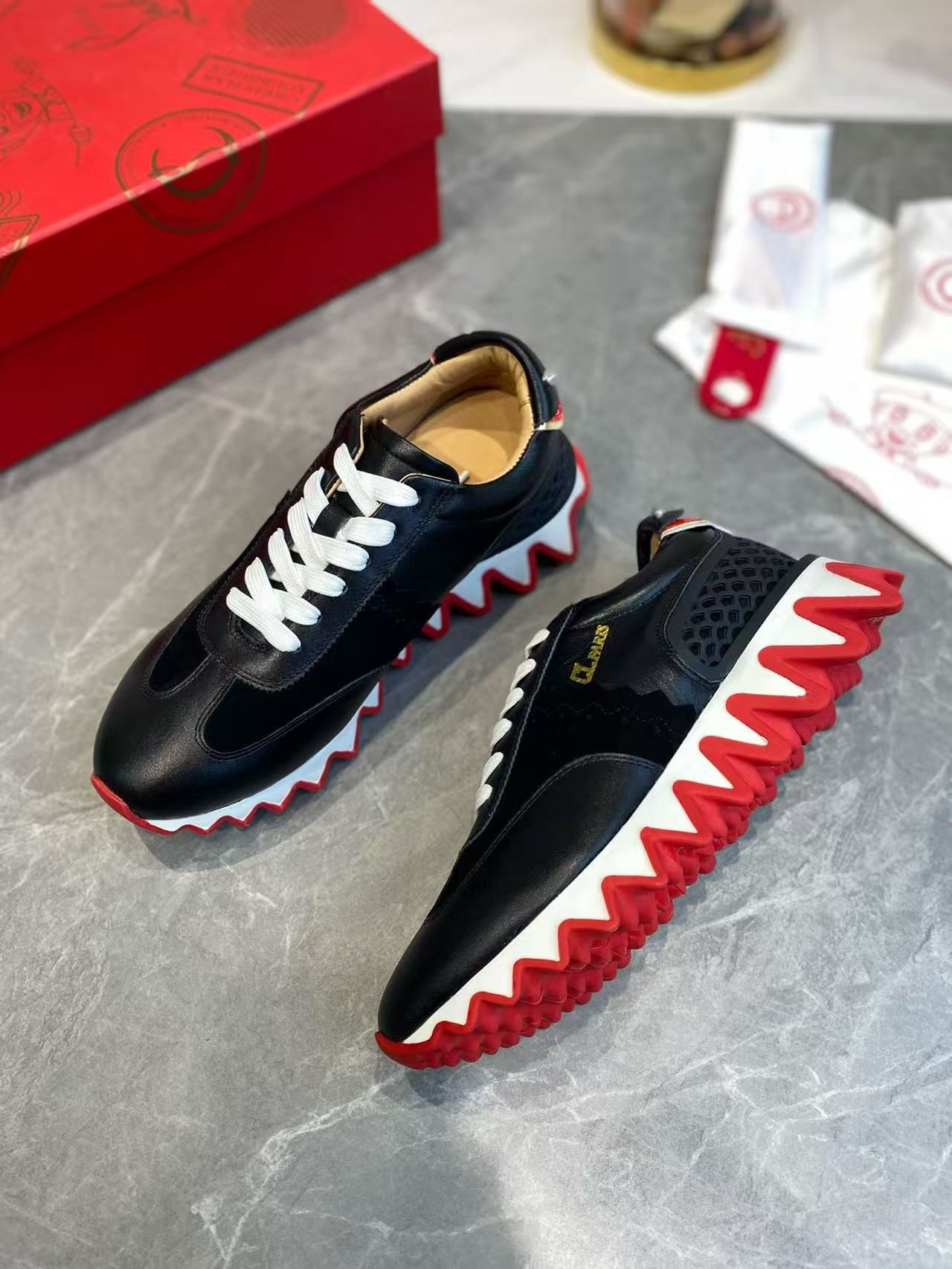 UA Ch**an Louboutin Loubishark Sneaker