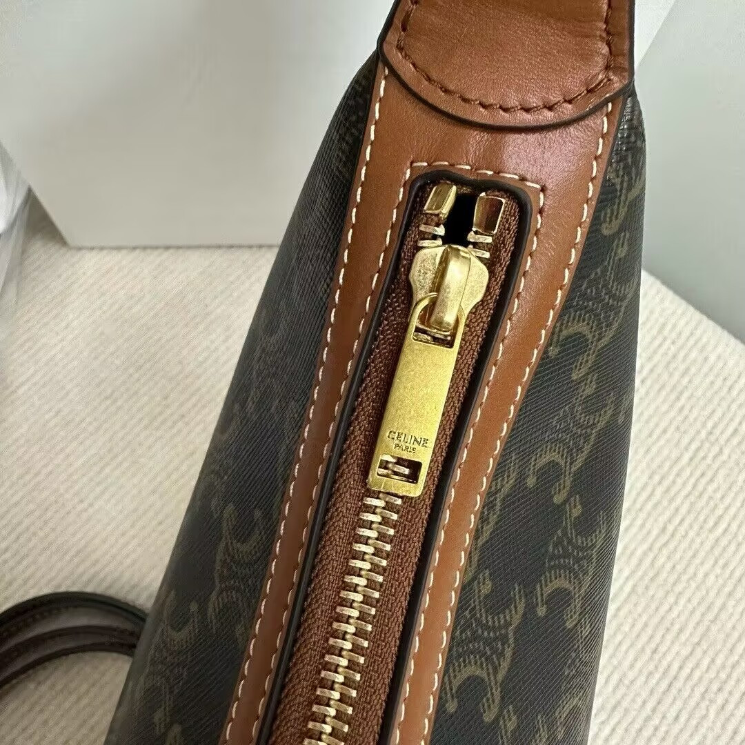 Ce**e SMALL HELOÏSE BAG IN TRIOMPHE CANVAS AND CALFSKIN 19x22x5cm