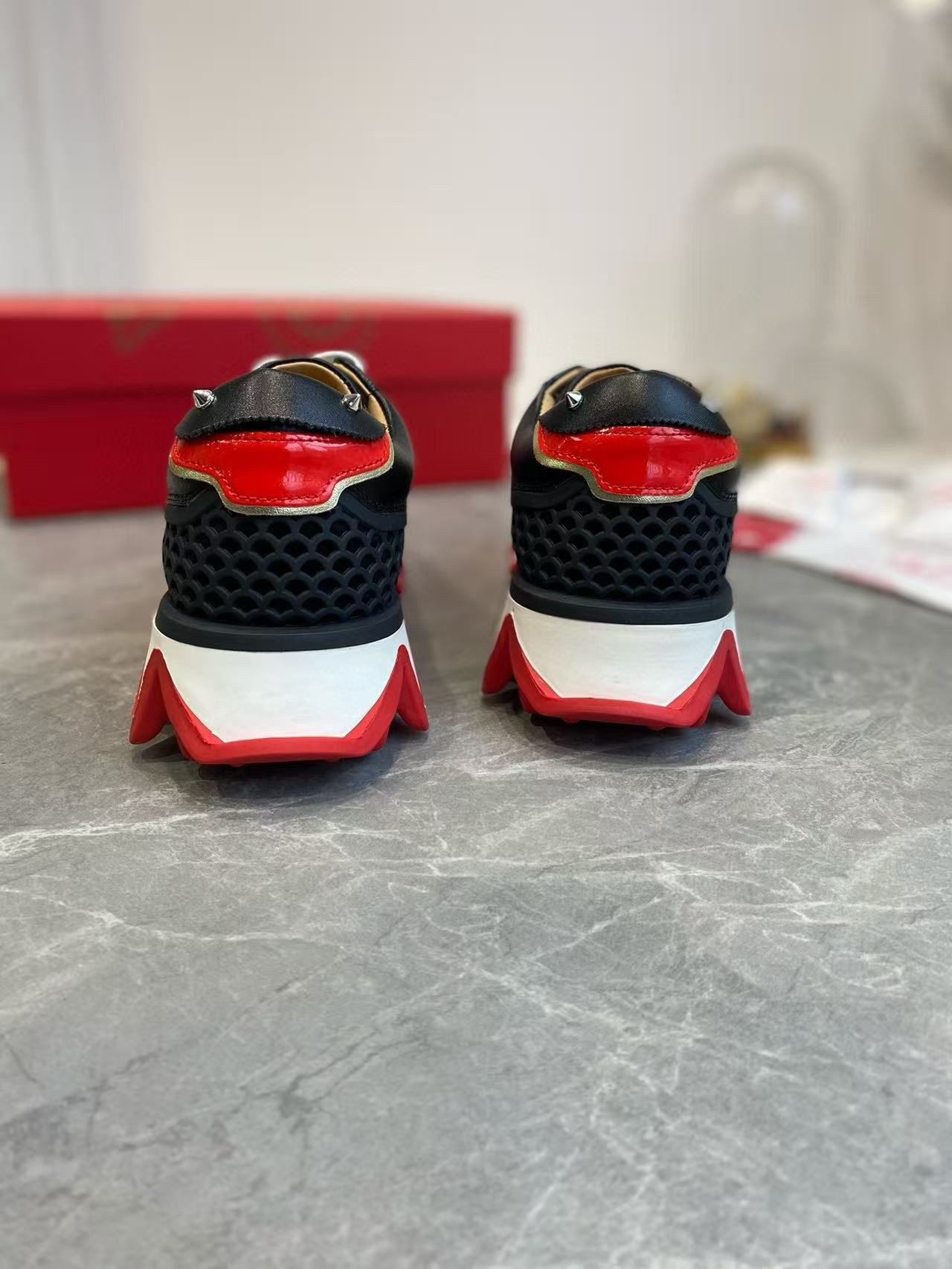 UA Ch**an Louboutin Loubishark Sneaker