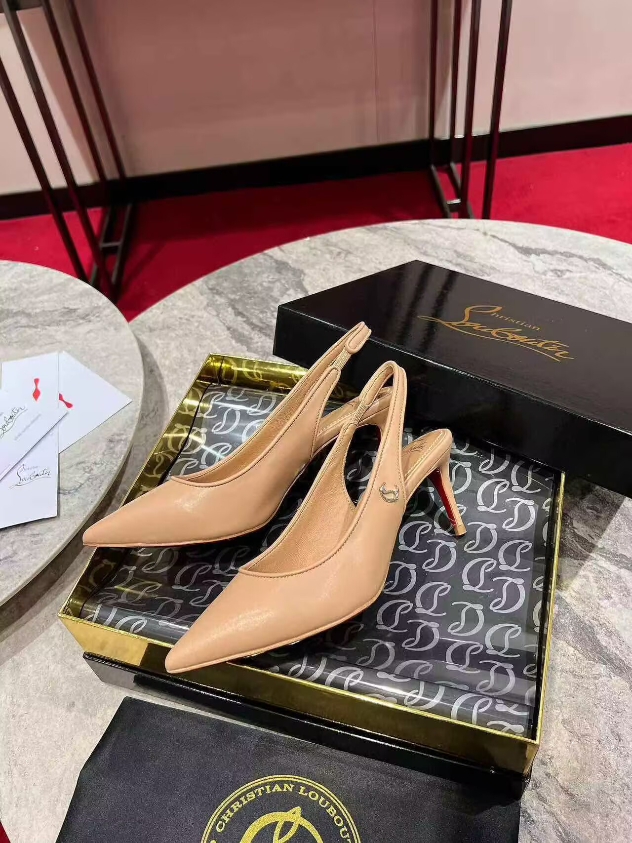 UA Ch**an Louboutin Sporty Kate Sling 65mm