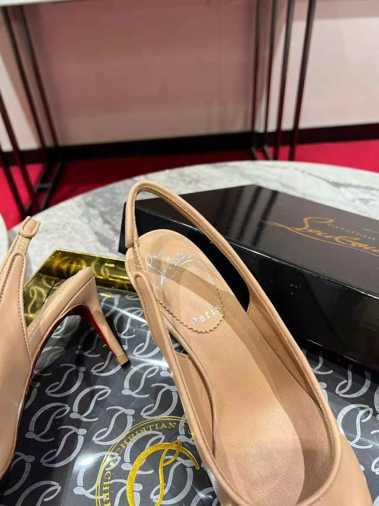 UA Ch**an Louboutin Sporty Kate Sling 65mm