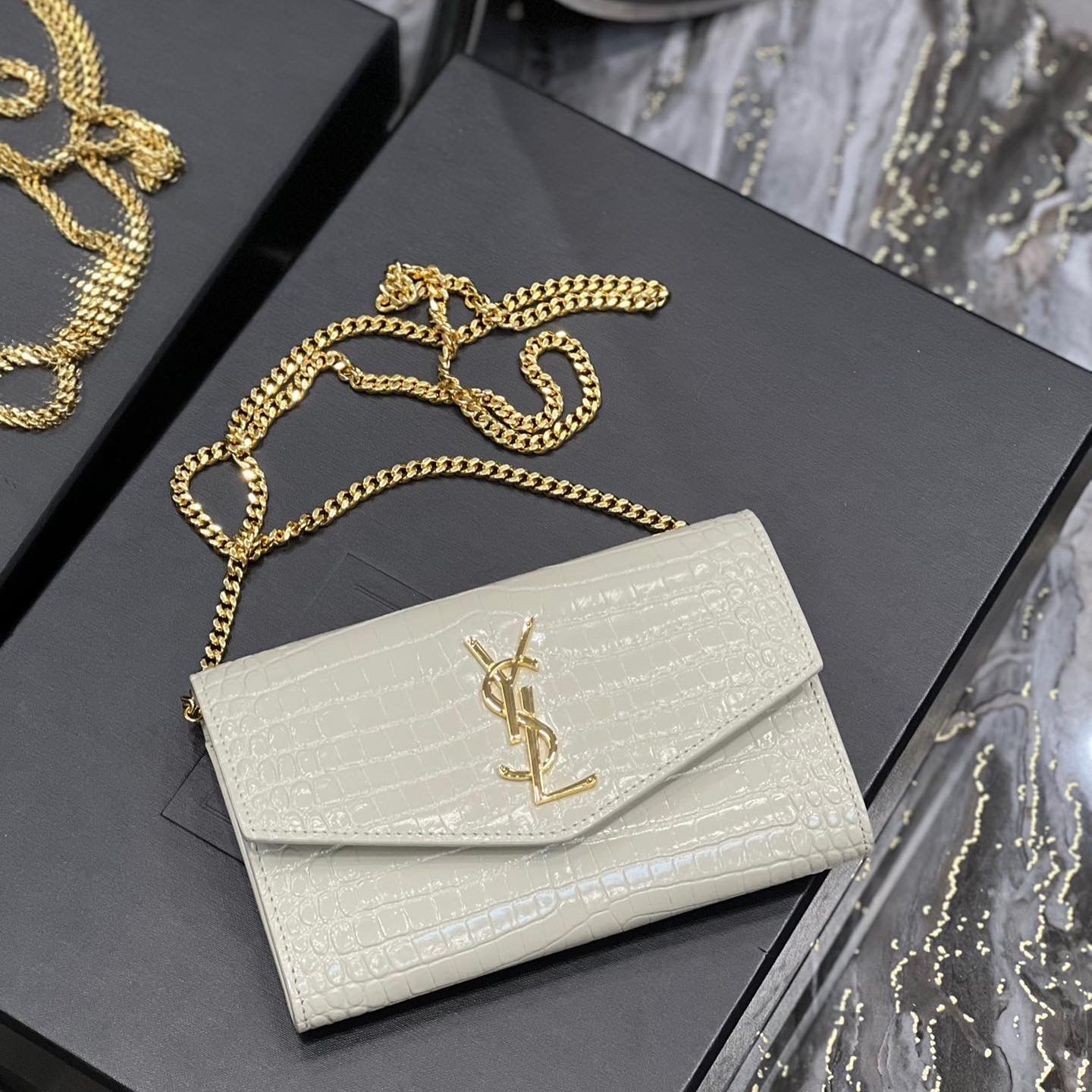 UPTOWN CHAIN WALLET IN CROCODILE-EMBOSSED SHINY LEATHER