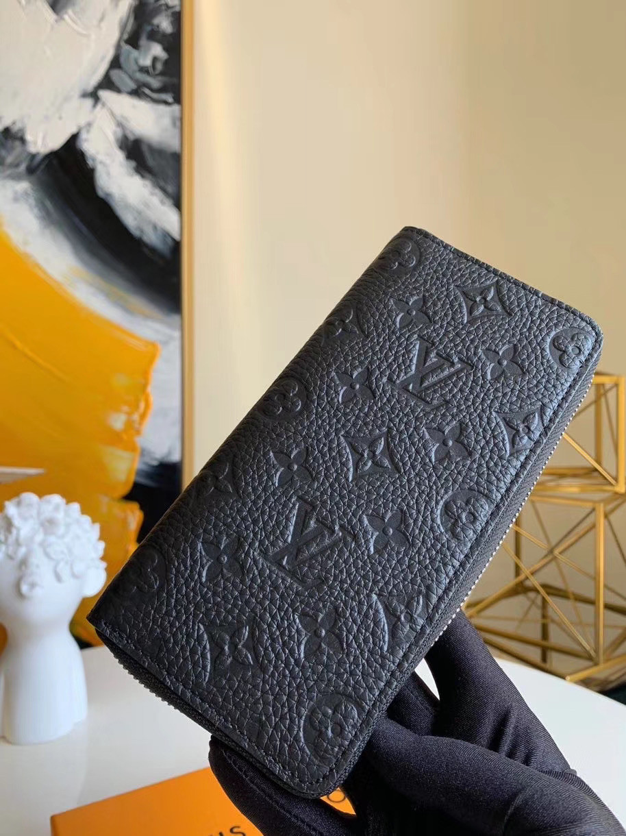 ZIPPY VERTICAL WALLET M69047