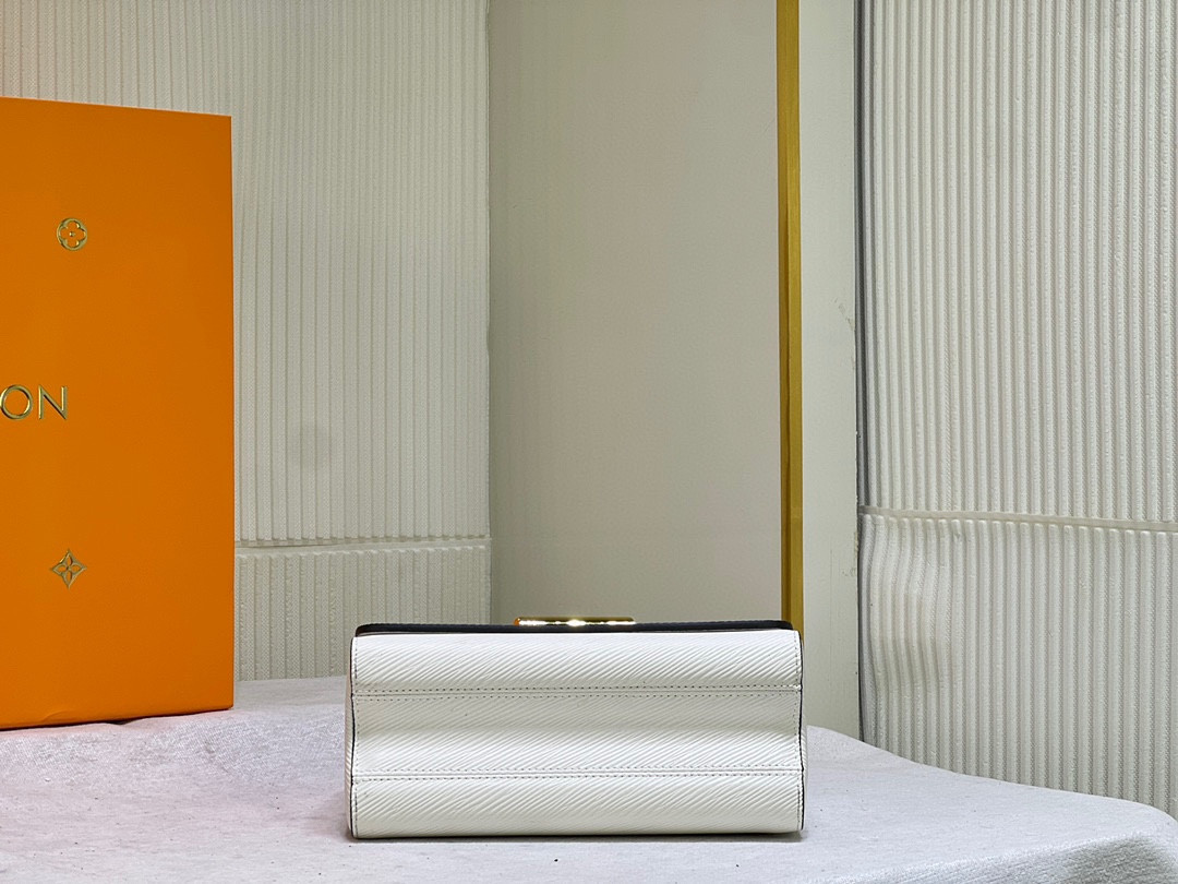 L0*is V*t0n Twist MM white 9.1 x 6.7 x 3.7 inches