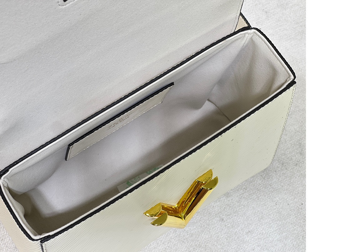 L0*is V*t0n Twist MM white 9.1 x 6.7 x 3.7 inches