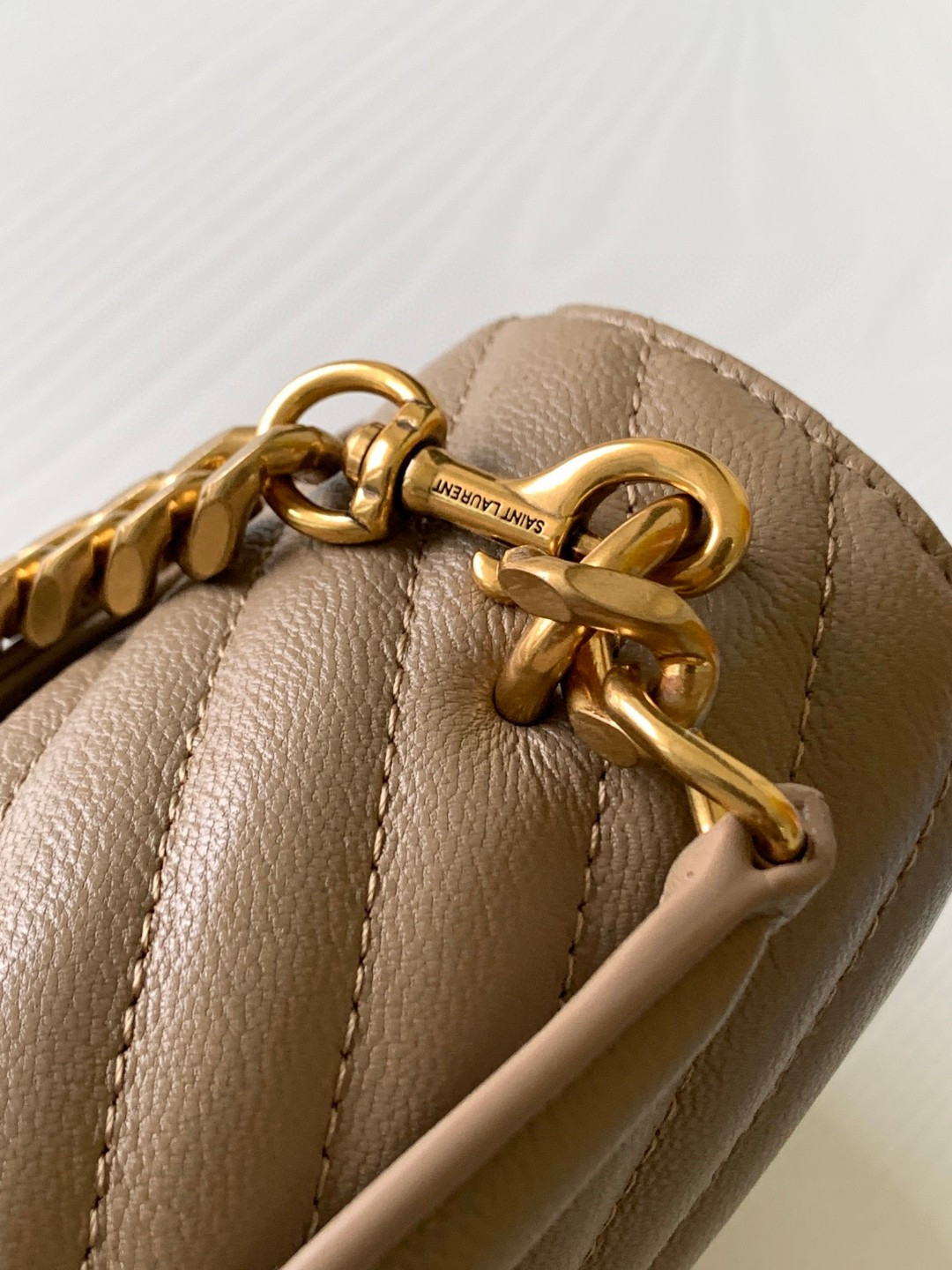 Y*L COLLEGE MEDIUM IN QUILTED LEATHER BROWN 9.4 X 6.6 X 2.5 INCHES