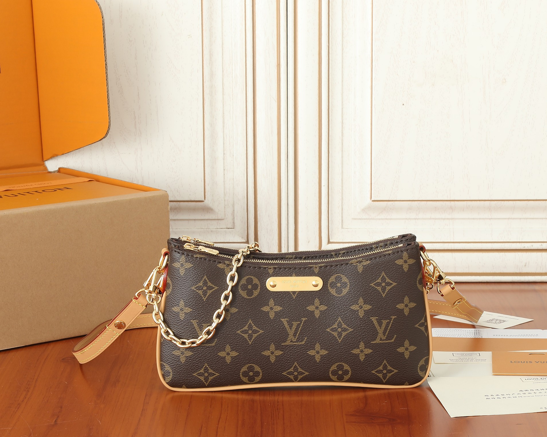 LV  Liv Pochette  M83008 9.6 x 5.3 x 2.6 inches