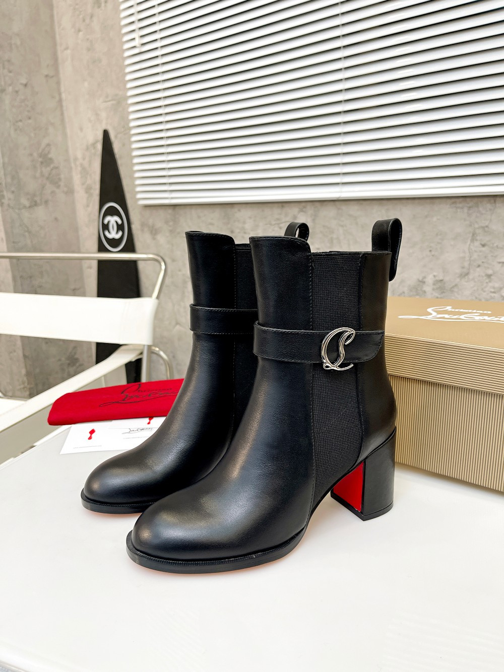 UA Ch**an Louboutin (CL) launched a new collection of chunky heeled platform boots