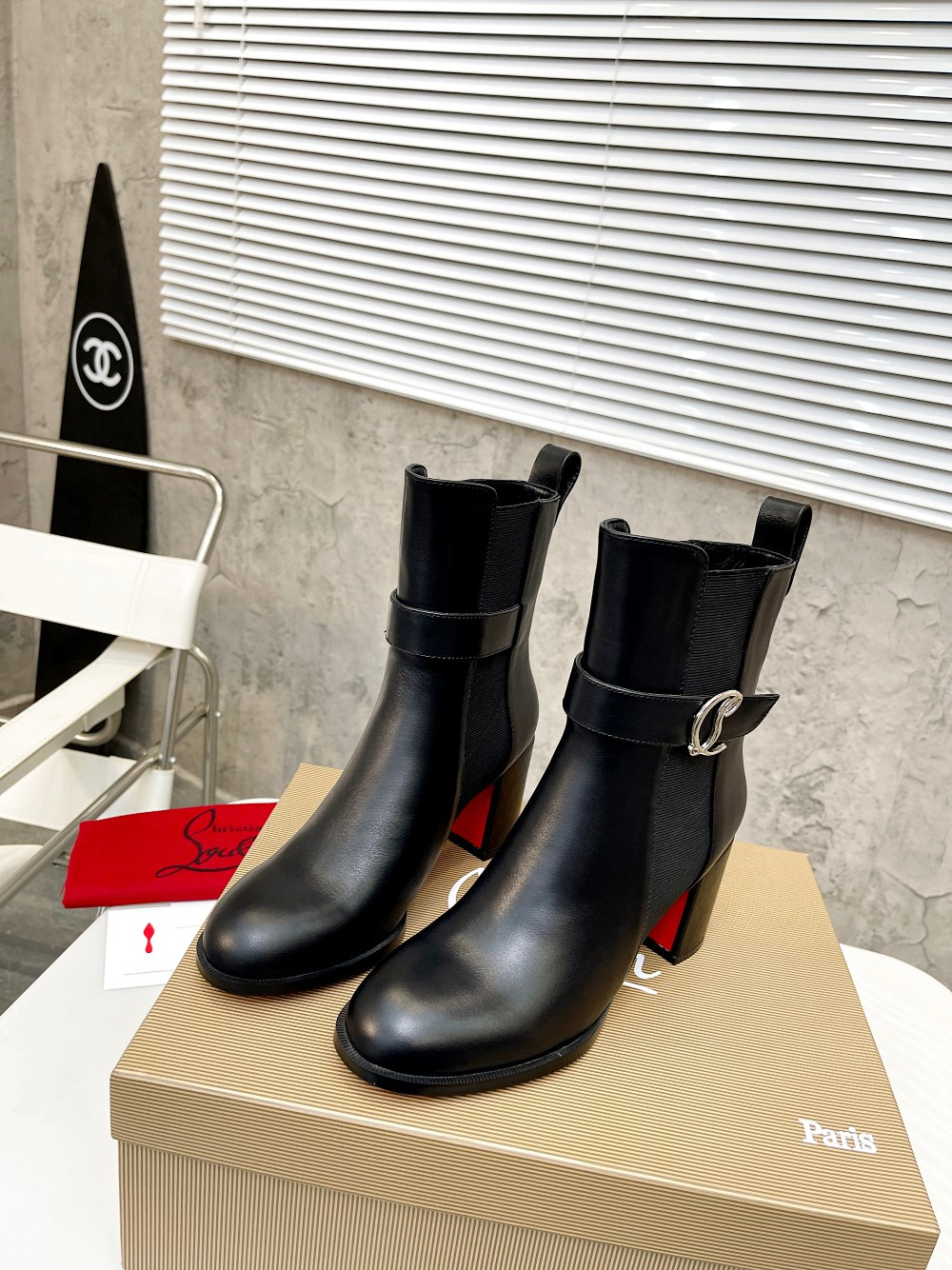 UA Ch**an Louboutin (CL) launched a new collection of chunky heeled platform boots