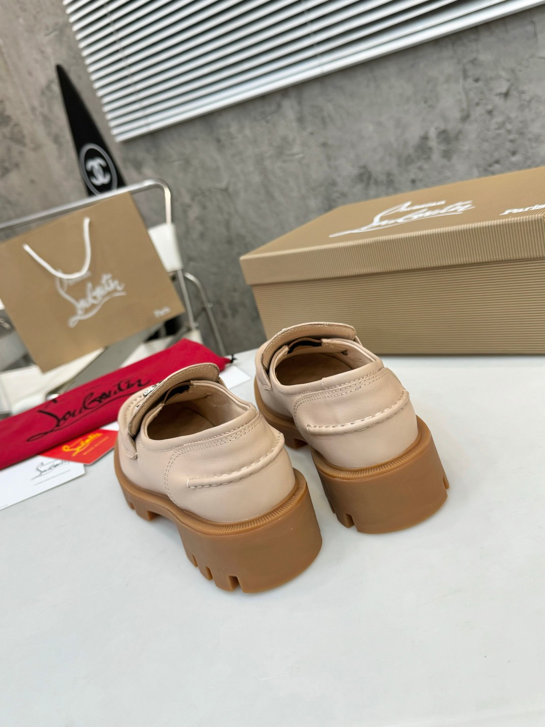 UA Ch**an Louboutin(CL) logo design,the latest runway version of the red-soled shoes