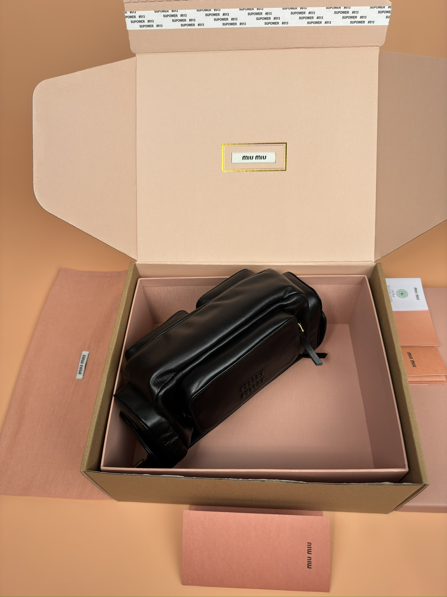 Miu Miu Hobo Nappa leather pocket bag 12x21x6cm