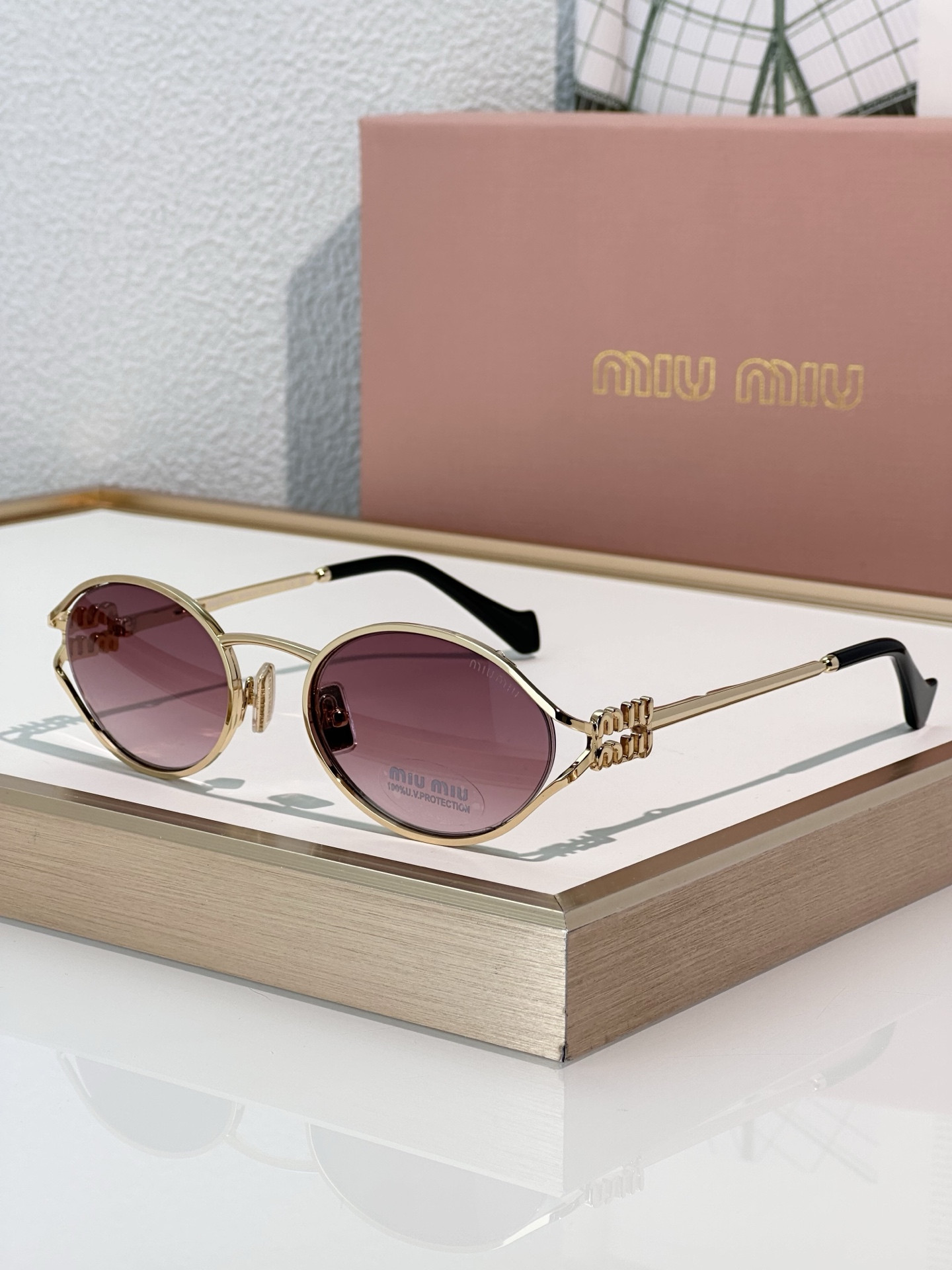 Miu Miu Glasses SMU52Y 54-21-125